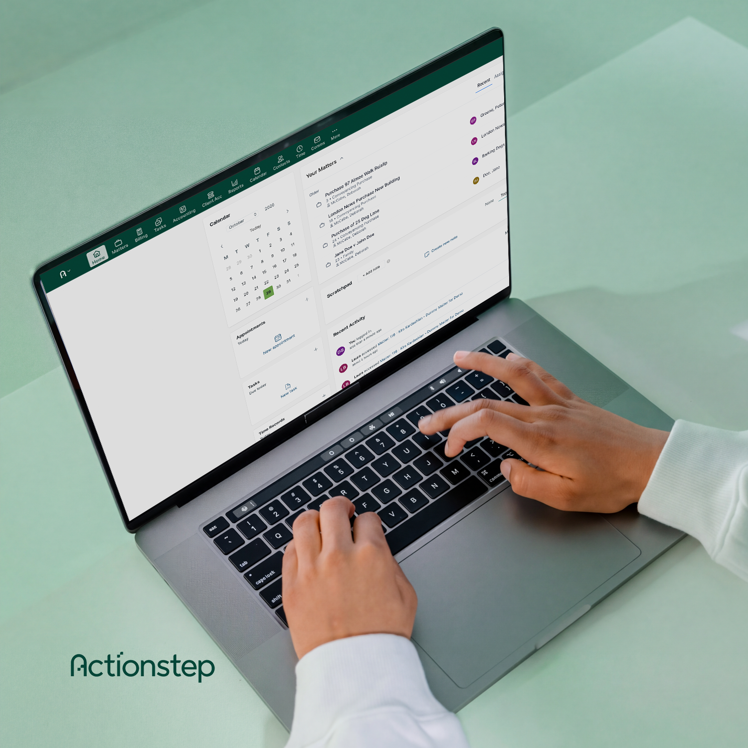 Man Working in Actionstep on Laptop
